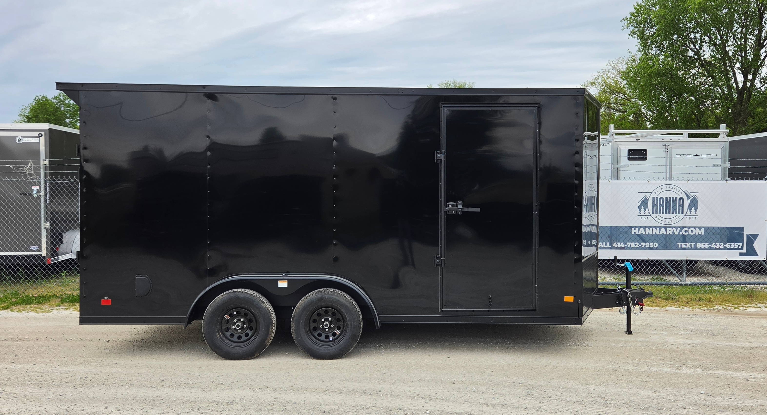 DarkHorse 7.5X16 Wedge Nose Tandem Axle Steel Cargo Trailer with Ramp Door, 6" Extra Height - 3500 Series - Black with Blackout Package